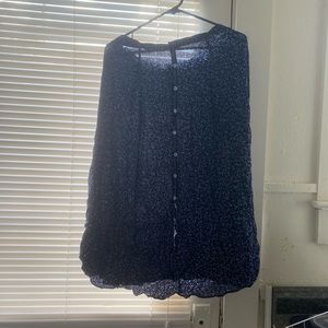 Navy skirt with white buttons.